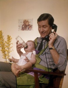  dad with baby bottle feeding