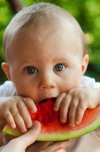  child eating food fruit